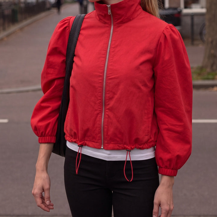 Red cropped jacket with high neck and puff sleeves