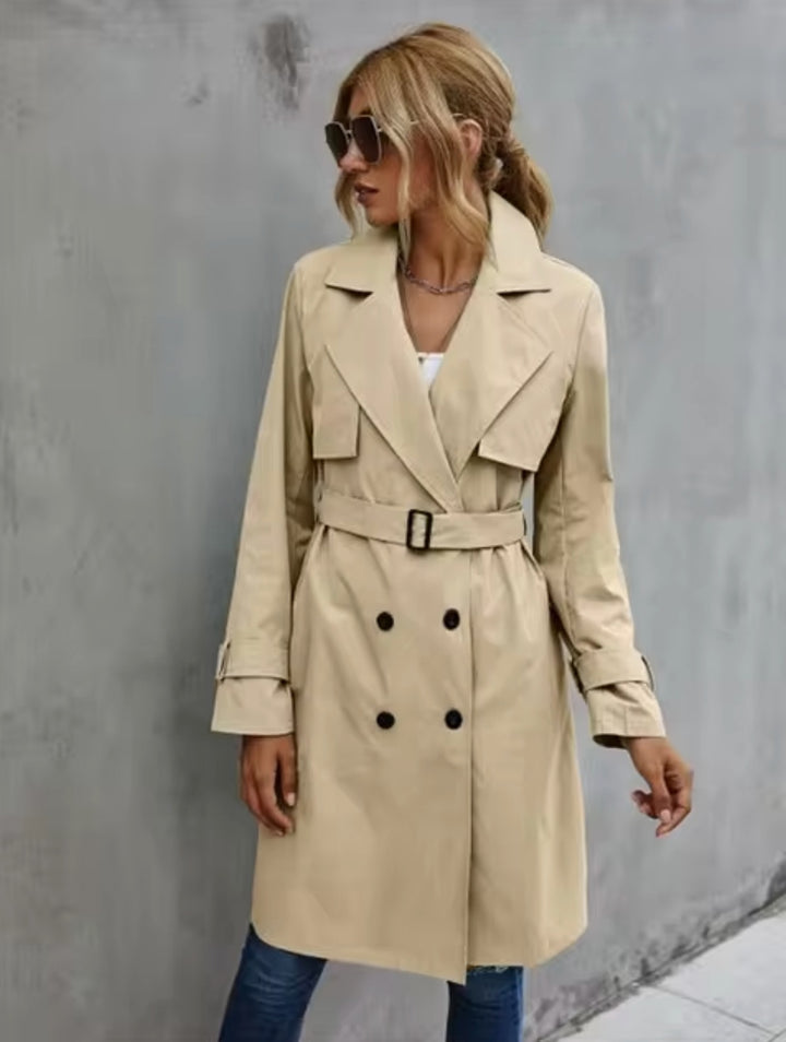 Woman wearing the Khaki double-breasted trench coat with belt