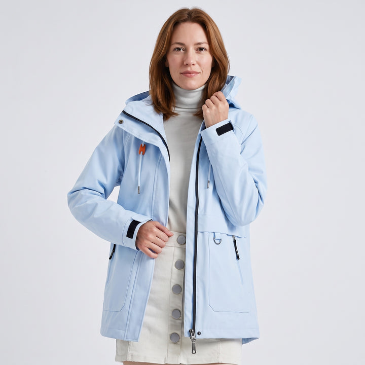Light blue hooded rain jacket with two-way zip and zipped pockets