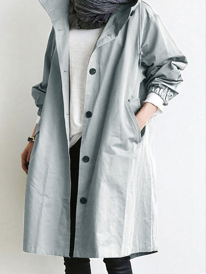 Light Grey hooded trench coat worn open over a white top