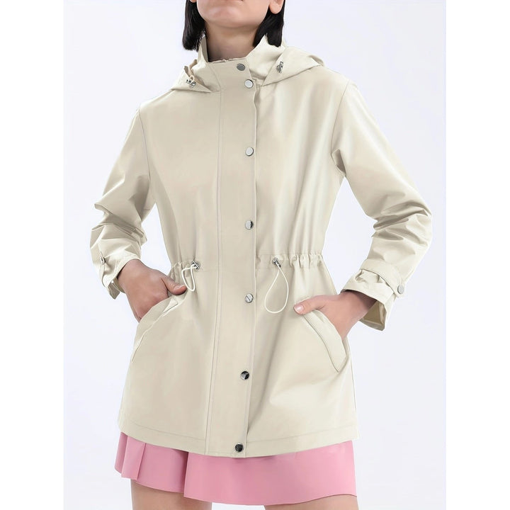 Ivory hooded rain jacket with drawstring waist and snap pocket flaps