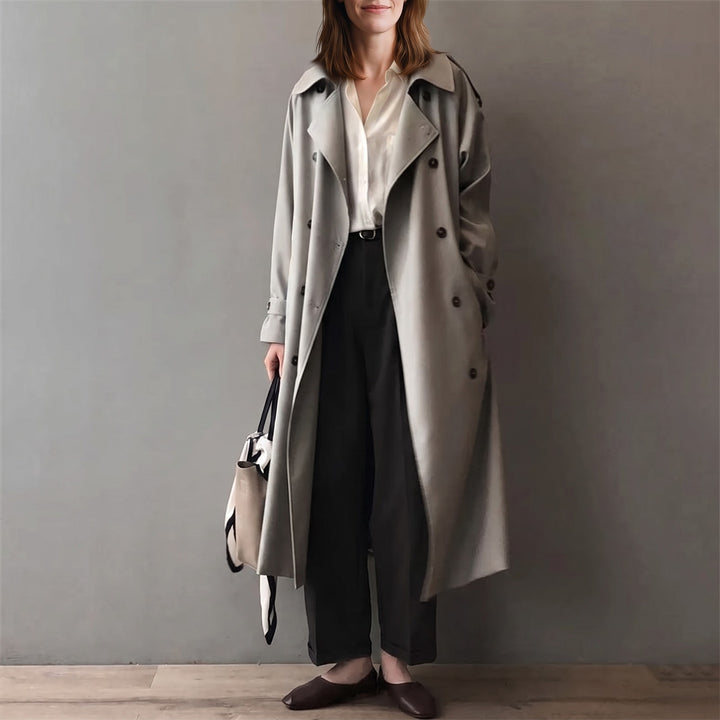 Woman wearing the Grey long double-breasted trench coat