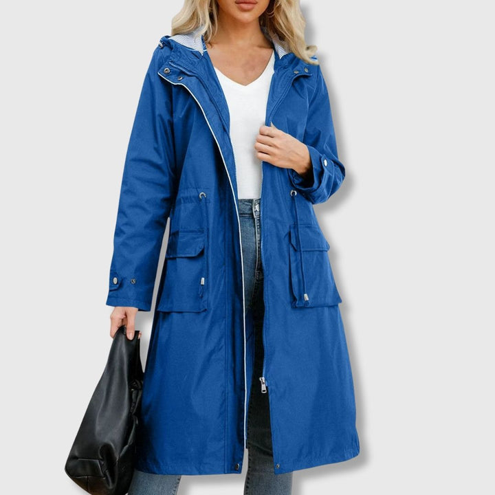 Blue long waterproof hooded raincoat with drawstring waist and flap pockets