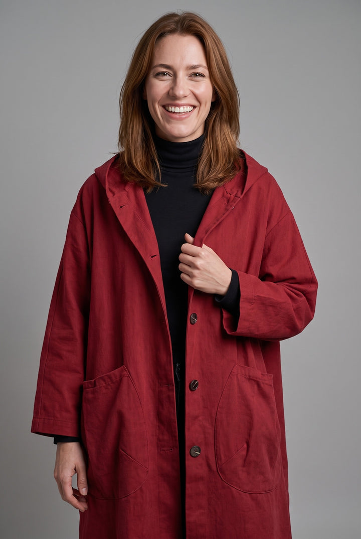 Red oversized long coat with hood and big patch pockets