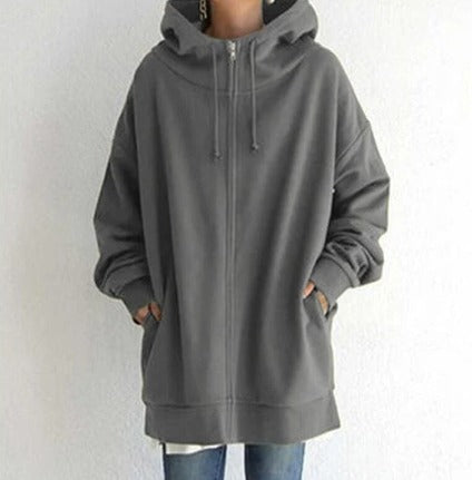 Gray oversized zip-up hoodie with pockets, worn by a person | Grace Aura